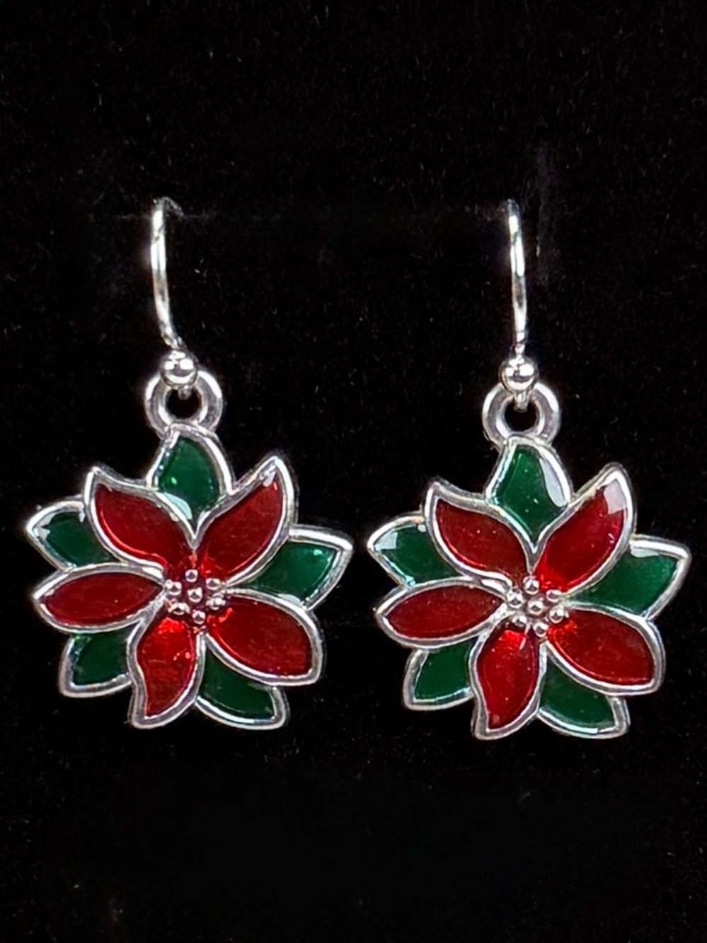 Beautiful Silvertone, red and green holiday flower pierced earrings